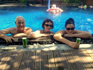Dad, mum and Sam enjoying the pool outside our rooms
