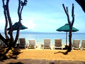 View from our table and Sanur Paradise Plaza Hotel beach lounges