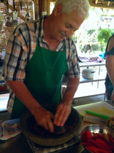 Dad having a go at crushing the spices